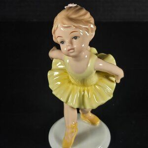 Cosmos Gifts Fine Porcelain Yellow Tutu, Ballerina Girl Figurine Beautiful !